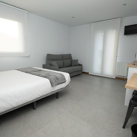 Apartamentos Puerta De Occidente Cornellana ภายนอก รูปภาพ