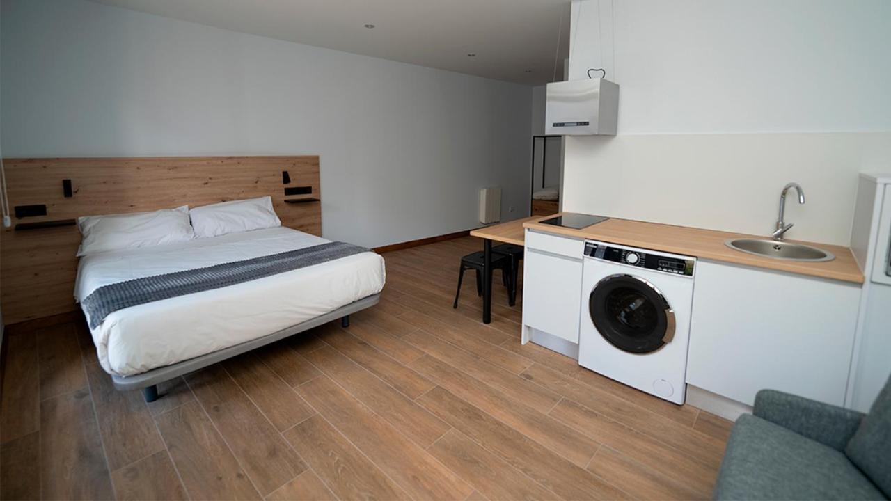 Apartamentos Puerta De Occidente Cornellana ภายนอก รูปภาพ
